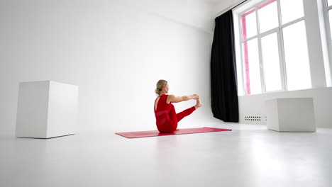 Flexible-young-fit-girl-practice-yoga-or-pilates-perform-Wild-Thing-Pose-for-stretching-and-wellness.-Yoga-postures---Asanas.-isolated-silhouette-on-white-background.